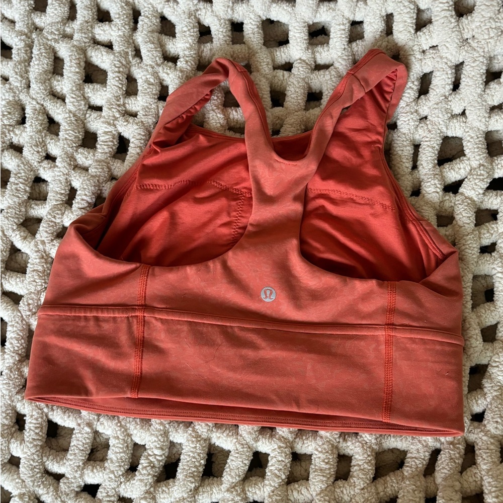 Orange Lululemon sports bra